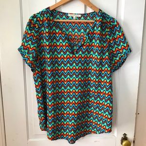 Brightly colored short sleeve blouse Daniel Rainn size-large